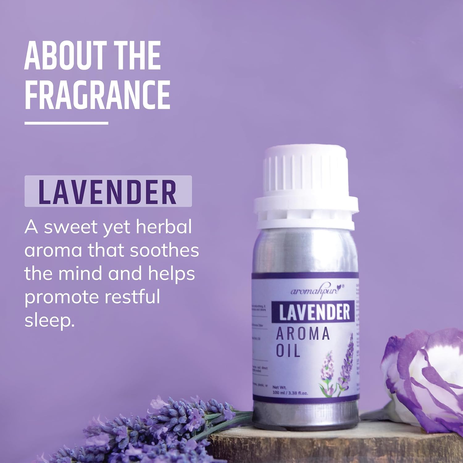Lavender aroma oil bottle with lavender flowers on a purple background