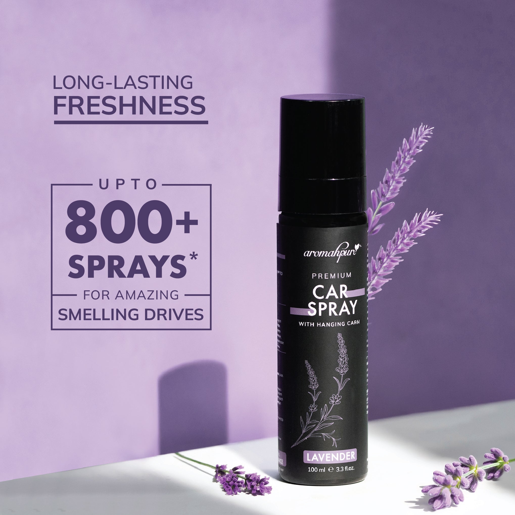 Car spray bottle with lavender flowers on a purple background