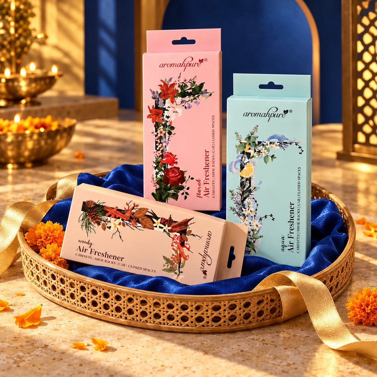 Aromahpure Aqua, Woody and Floral Closair pack of three styled in a festive tray