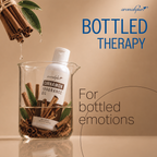 Aromahpure Cinnamon Fragrance Oil bottle in a beaker with cinnamon sticks and green leaves – Bottled Therapy for bottled emotions